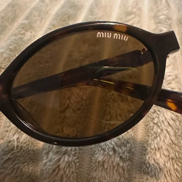 Miu Miu Regard oval sunglasses - Picture 8 of 10